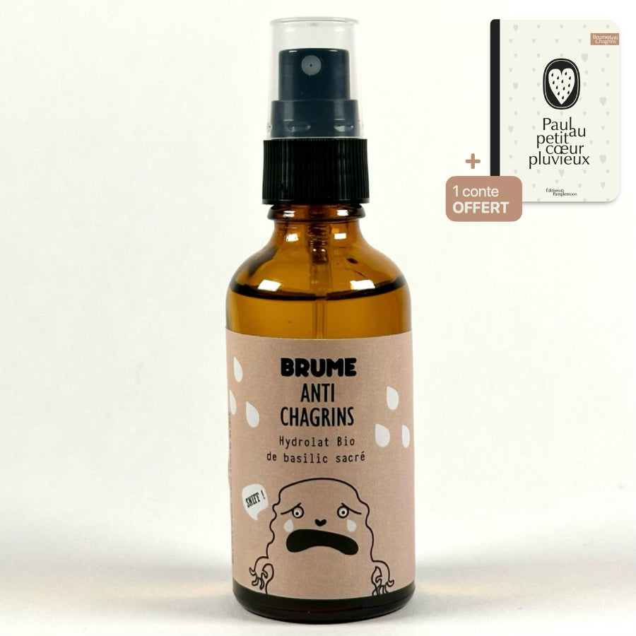 Image d'un Flacon de Brume Anti-Chagrins à l'Hydrolat Bio de Basilic Sacré pour Enfants, sur fond neutre (indiquant, en haut à droite, un conte pour enfants offert — Paul au Petit Cœur Pluvieux).